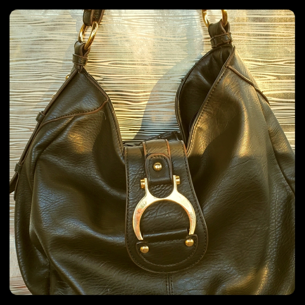 Black and gold buckle strap purse